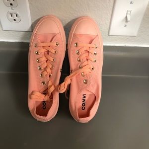 Peach women’s low top converse